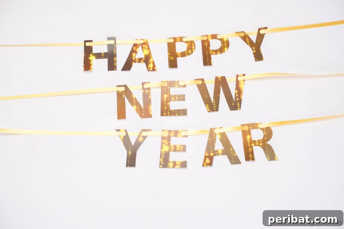 Free Printable Happy New Year Banner Instant 10 Minute Setup 11 The completed Happy New Year banner, elegantly displayed on a clean white surface, showcasing the final DIY result.