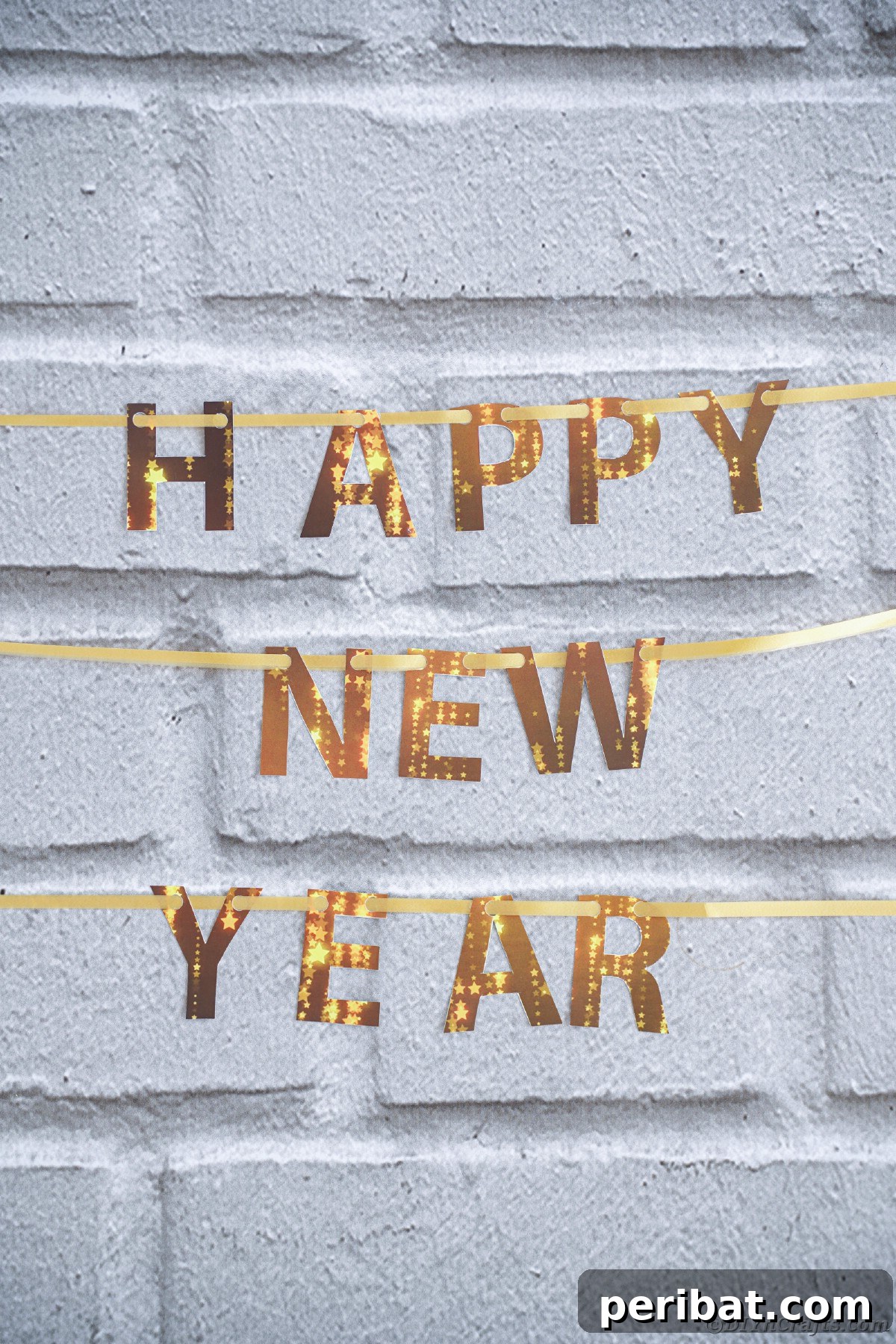Free Printable Happy New Year Banner Instant 10 Minute Setup 17 Happy New Year banner adorned with gold glitter lettering, contrasting beautifully against a rustic brick wall, adding a touch of glamour.