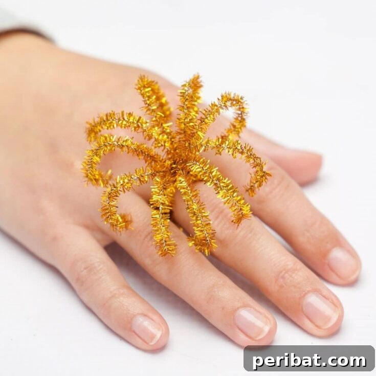 Twist Up a Dazzling Pipe Cleaner Fireworks Ring 17 A bright and festive pipe cleaner fireworks ring captured in a close-up shot, inviting viewers to engage in the craft