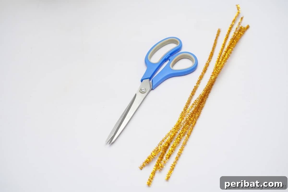 Twist Up a Dazzling Pipe Cleaner Fireworks Ring 7 A simple array of craft supplies: pipe cleaners in various colors and a pair of scissors, ready for creative use