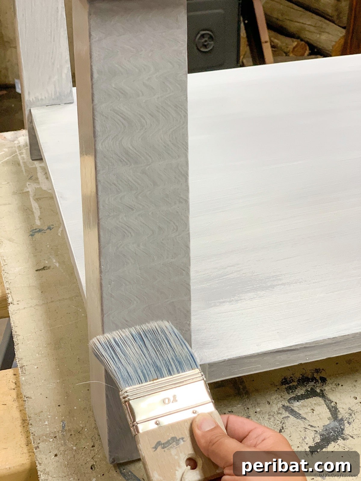Painting table legs with 'S' formation for texture