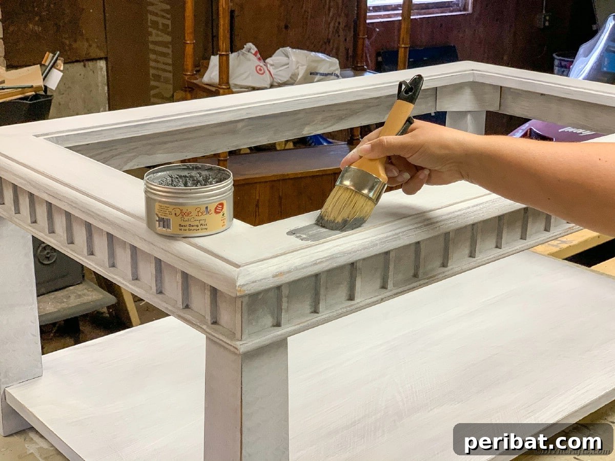 Applying wax to the restored table