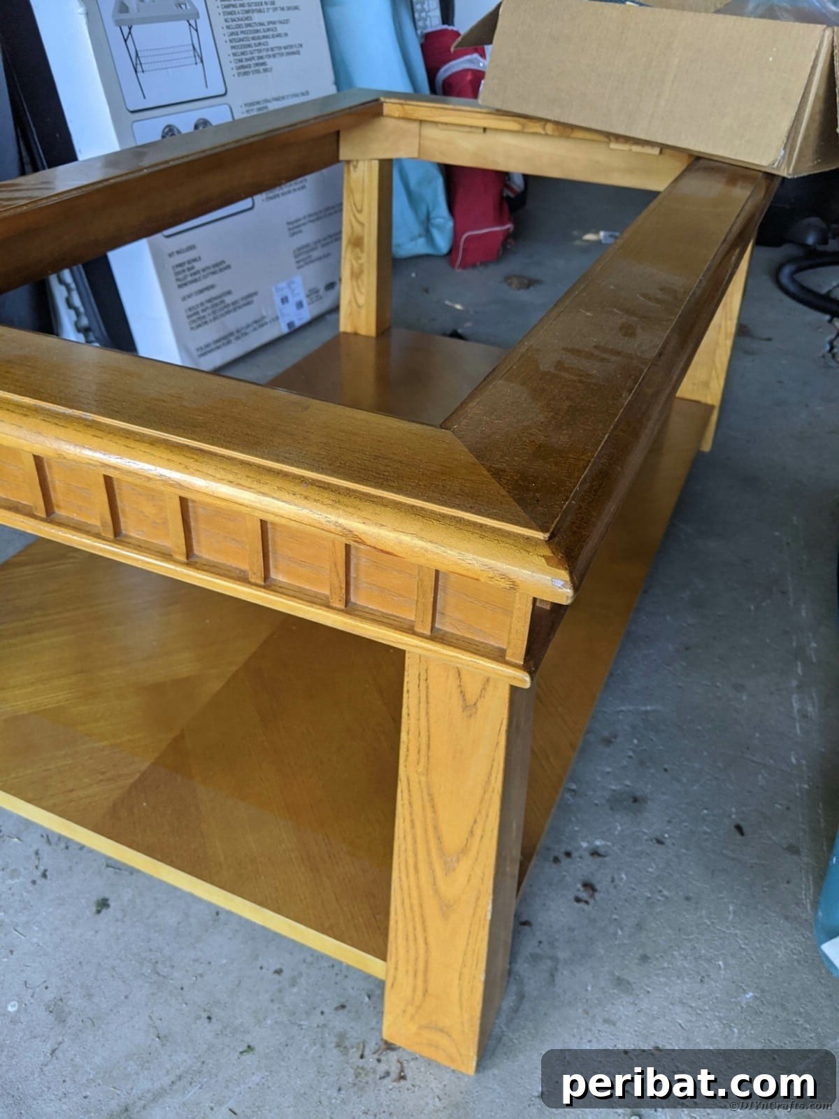 Wood table before restoration, showing old finish
