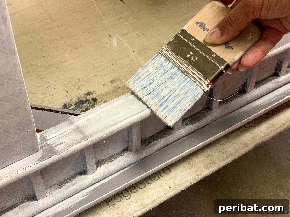 Applying linen wash paint to the table top