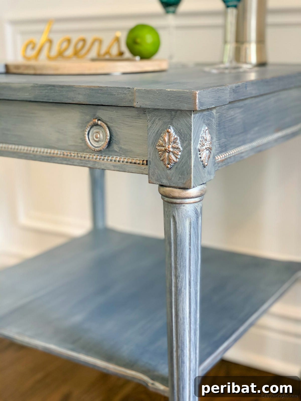Close-up of side table details before restoration, showing wood grain and texture