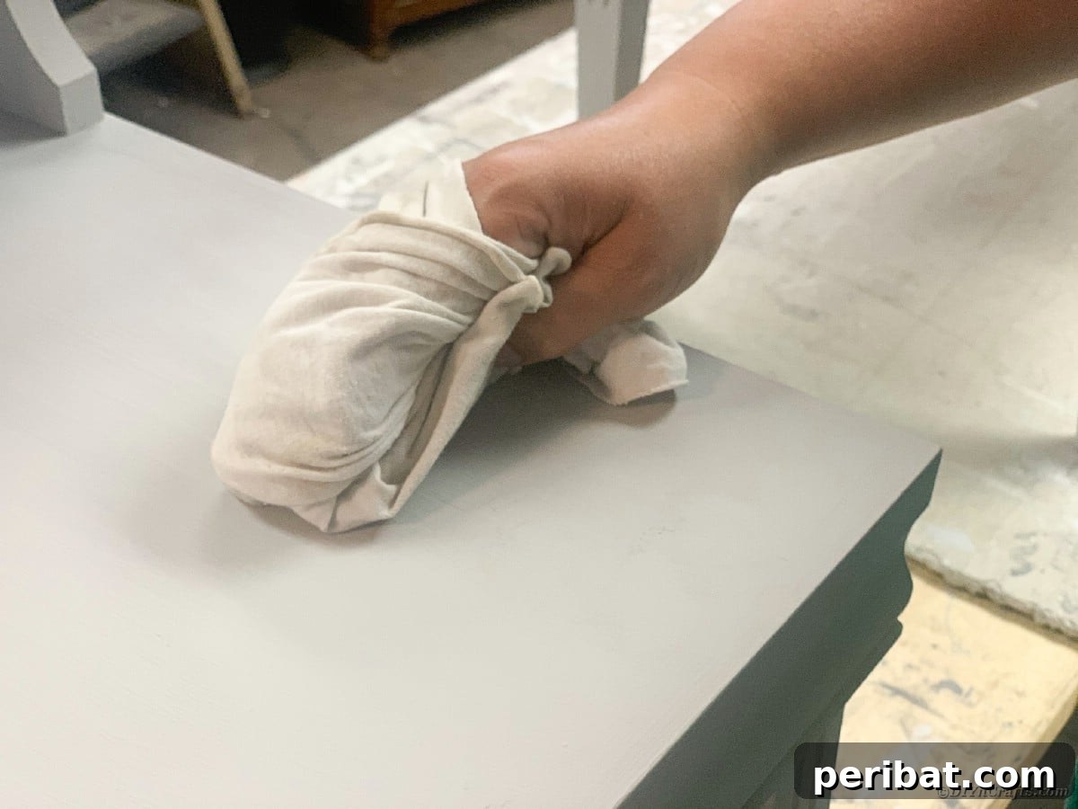 Mid Century End Table Makeover: A Step-by-Step Guide 11 Wiping table