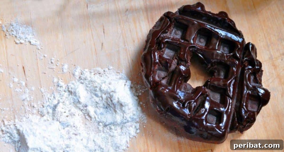Dense, waffled chocolate donuts, with a rich chocolate glaze, offering a unique texture and flavor.