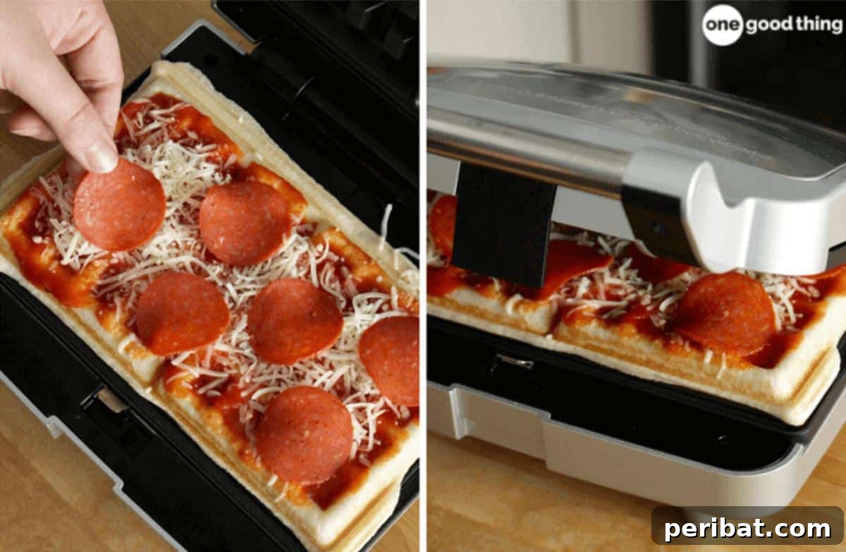 A delicious personal pizza cooked in a waffle iron, featuring a crispy, textured crust and melted cheese with classic toppings.