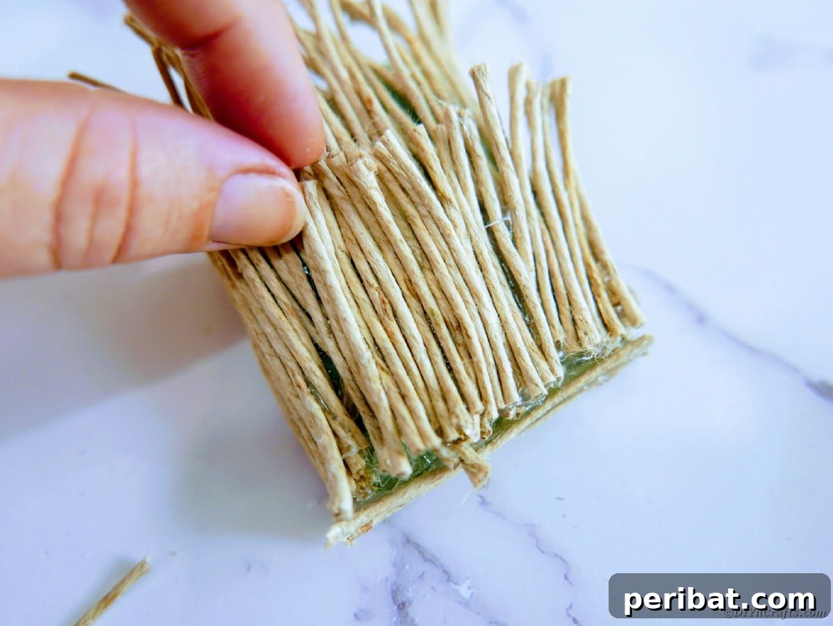 Create a Charming Burlap Hedgehog Decoration 12 Layering shorter twine pieces with hot glue on top of longer ones