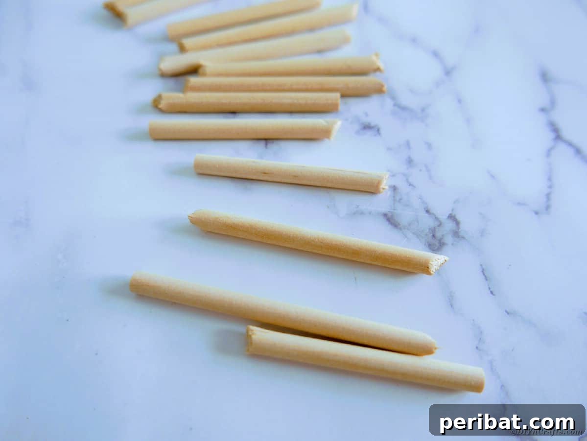 Create a Charming Burlap Hedgehog Decoration 14 Cut wooden dowels arranged on a table for hedgehog spikes