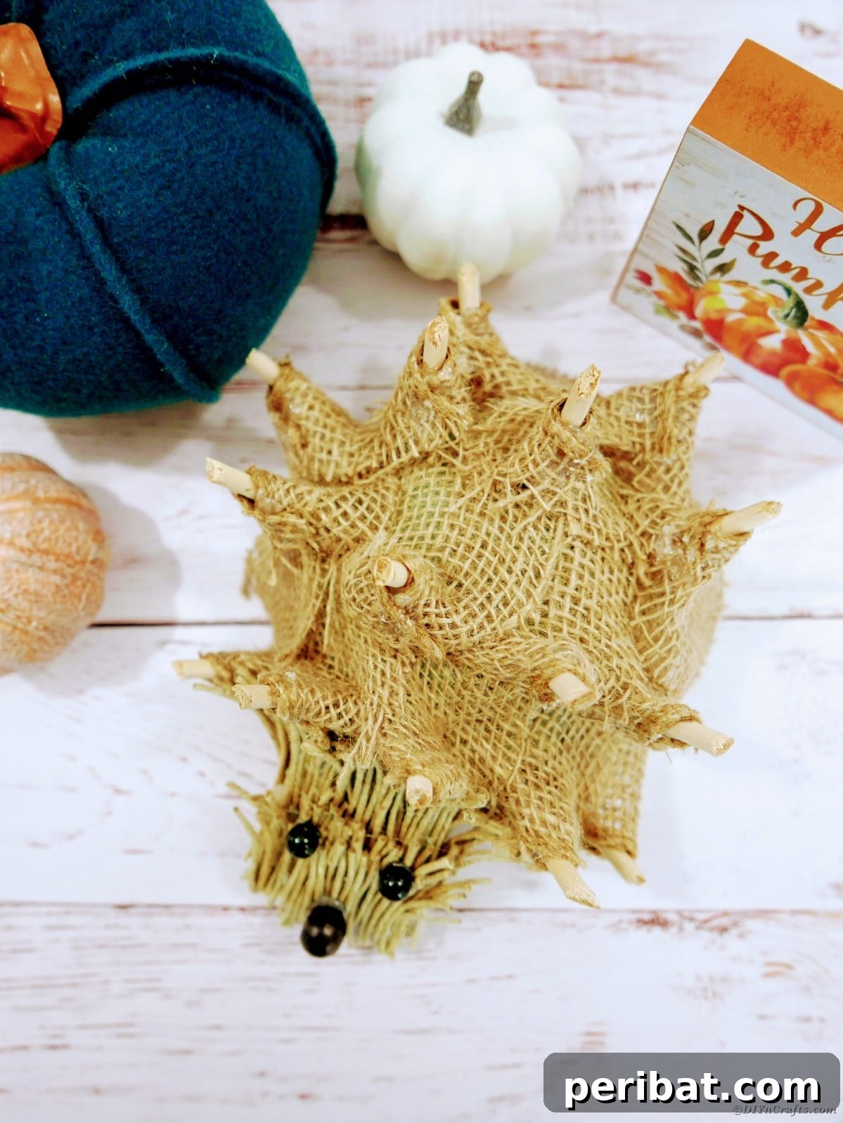 Create a Charming Burlap Hedgehog Decoration 5 Assortment of handmade burlap hedgehogs in different sizes and angles