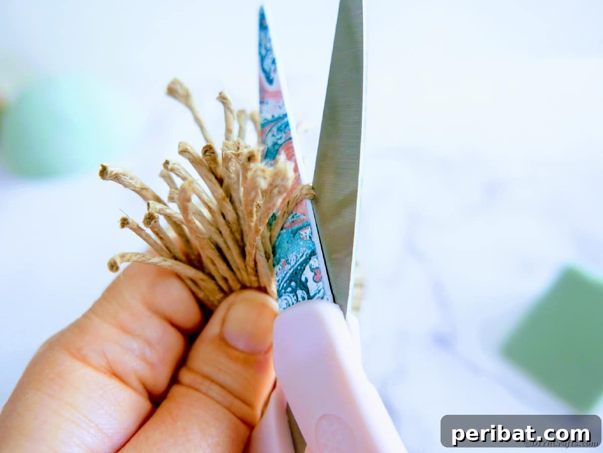Create a Charming Burlap Hedgehog Decoration 10 Cutting looped twine into individual strands for hedgehog craft