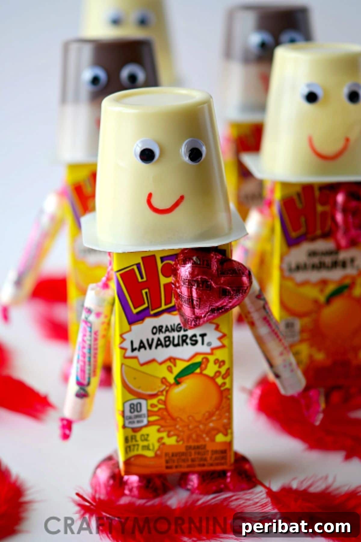 Crafty Cupid: Valentine's Day Gifts Kids Can Make 11 Creative Valentine robot snacks made from juice boxes, pudding cups, and candy with googly eyes
