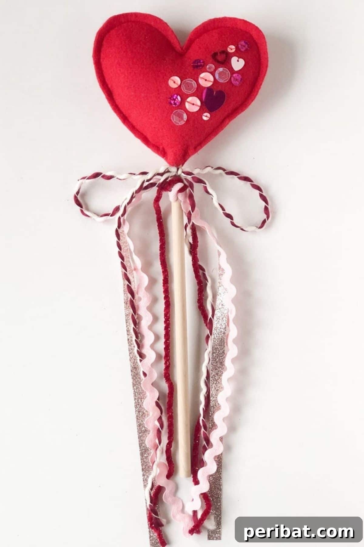 Crafty Cupid: Valentine's Day Gifts Kids Can Make 21 Handmade felt heart wand with a ribbon, perfect for imaginative play on Valentine's Day