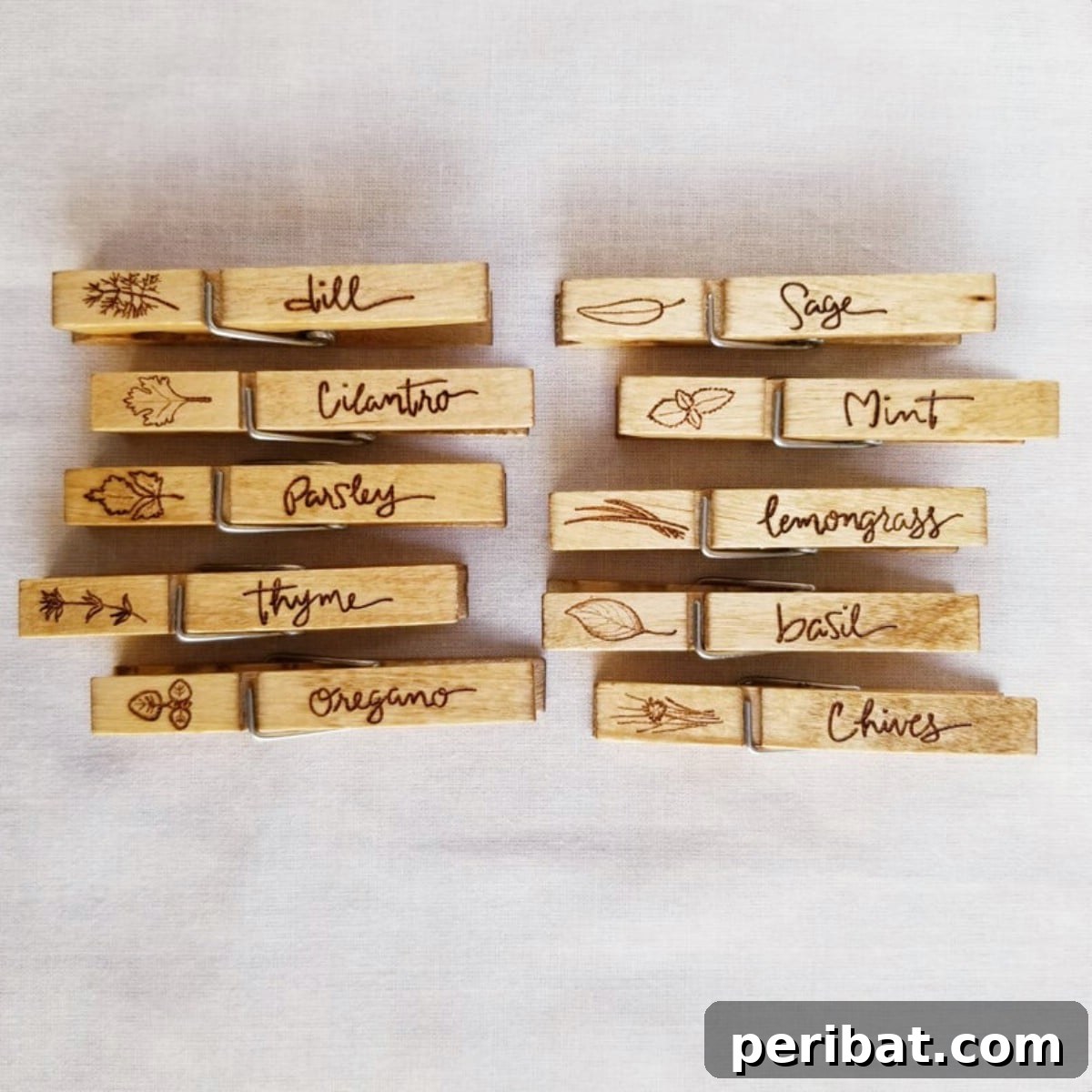 Wood etched garden marker clothespins on white table