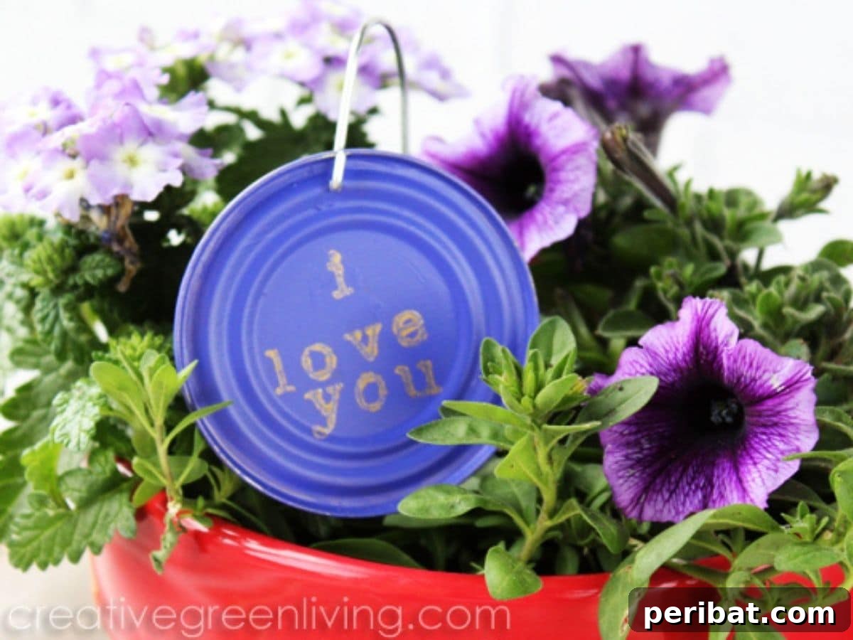 Purple painted tin can lid in potted plant
