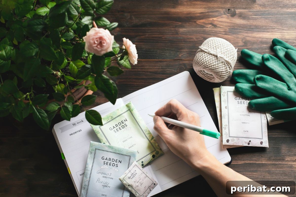 writing in a notebook with seed sachets and plants 