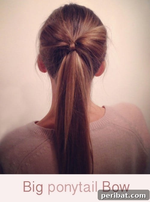 Create a bold hair bow as an embellishment on your ponytail, inspired by pop culture