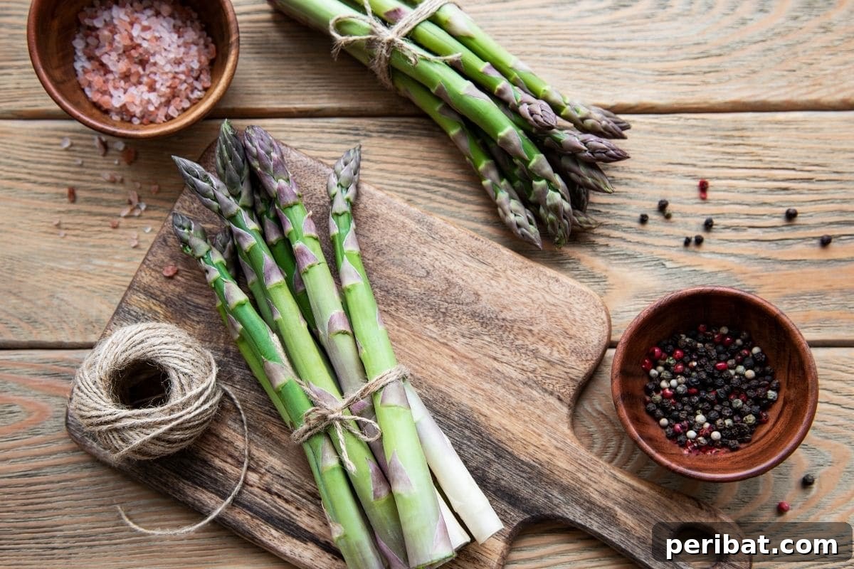23 Plant Nemeses: Why Certain Species Should Never Coexist 21 tied together asparagus in a table, showing harvested stalks.