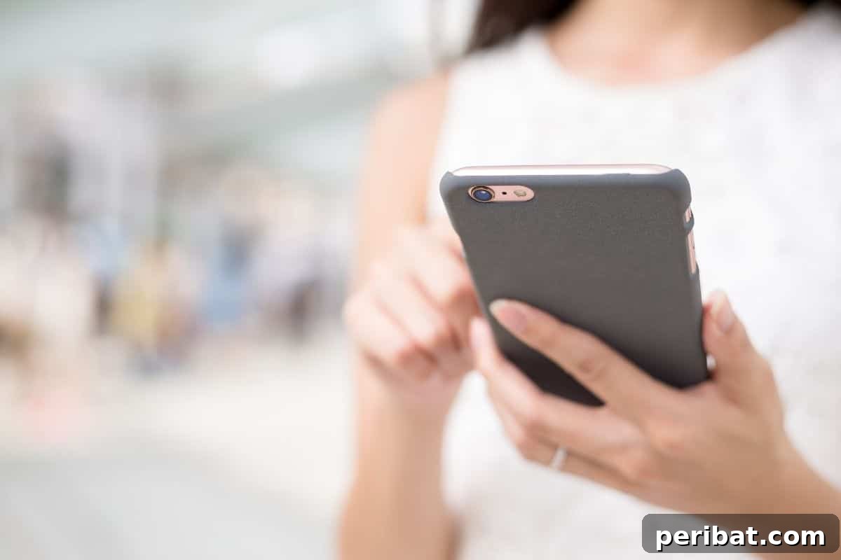 holding a cellphone, searching where to get free garden containers 