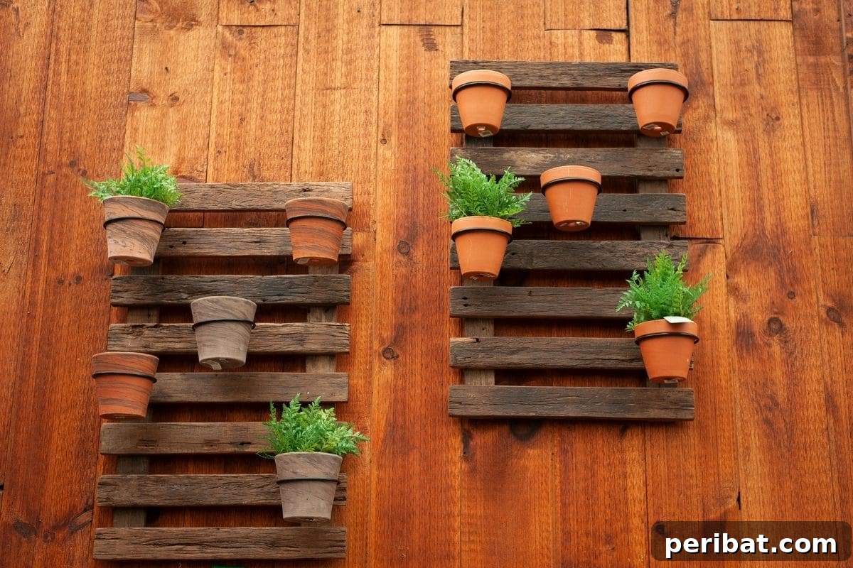 Vertical Oasis: 18 Creative Hanging Plant Ideas for Compact Living 14 pallets in a wall with pots