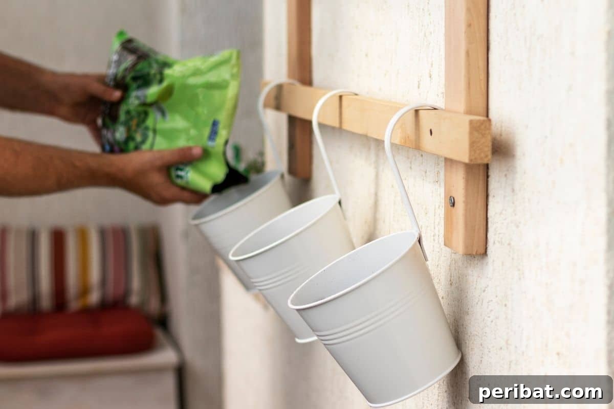 Vertical Oasis: 18 Creative Hanging Plant Ideas for Compact Living 4 filling the hanging bucket in the shelf against a wall