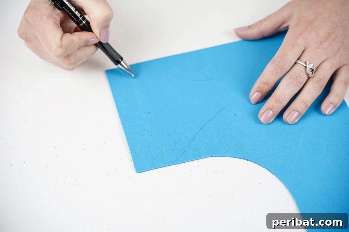 Crafting Whimsical Fish and Bird Decor from Old CDs 16 Tracing on blue foam paper