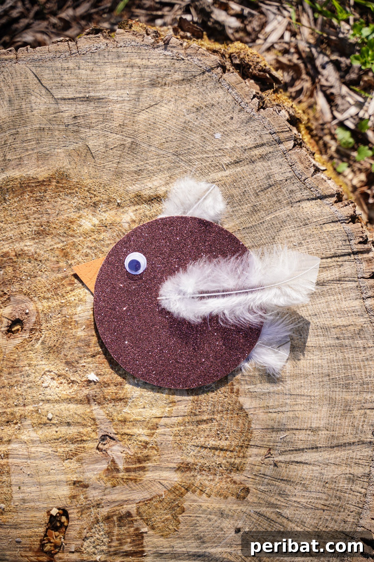 Crafting Whimsical Fish and Bird Decor from Old CDs 21 Brown CD bird on wood stump