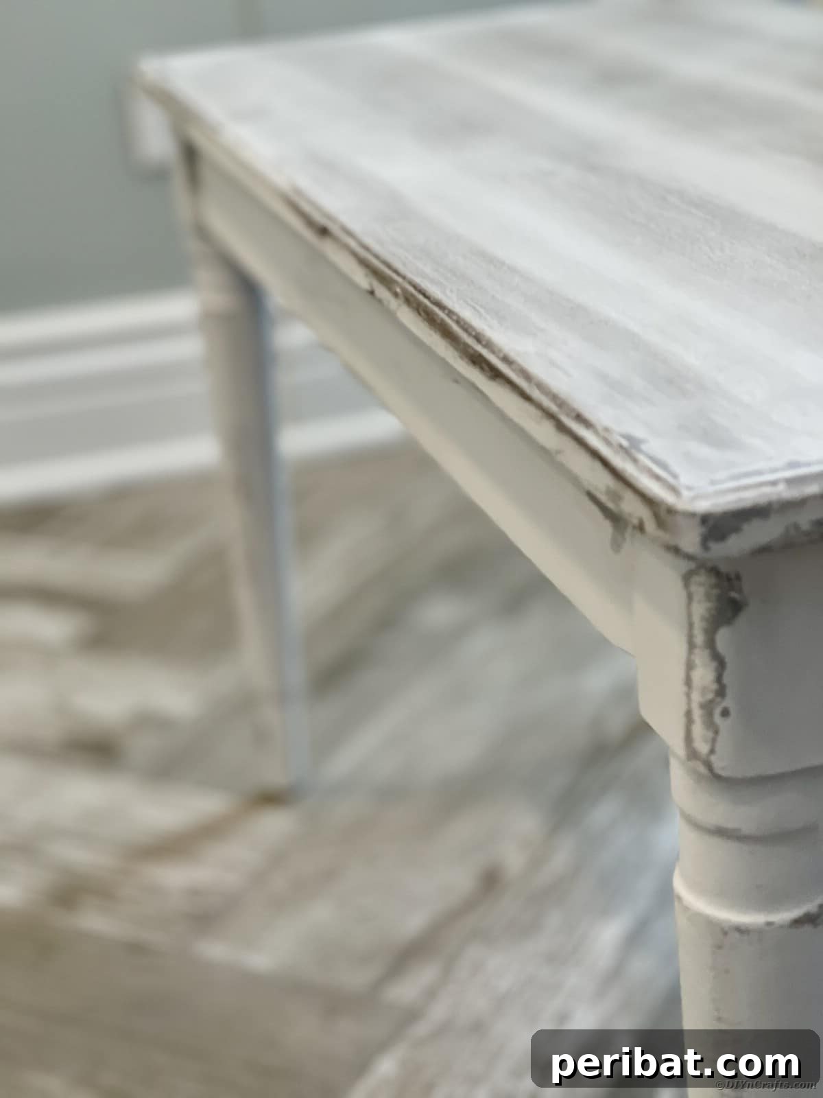 Distressed dining table and bench in a completed farmhouse style setting