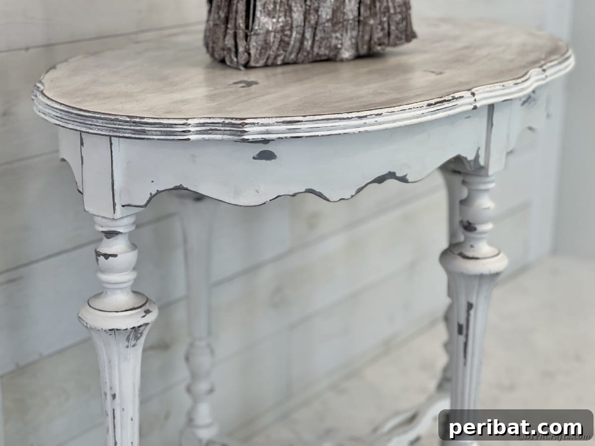 Chippy Charm Side Table Transformation 2 Front of distressed side table against white wall