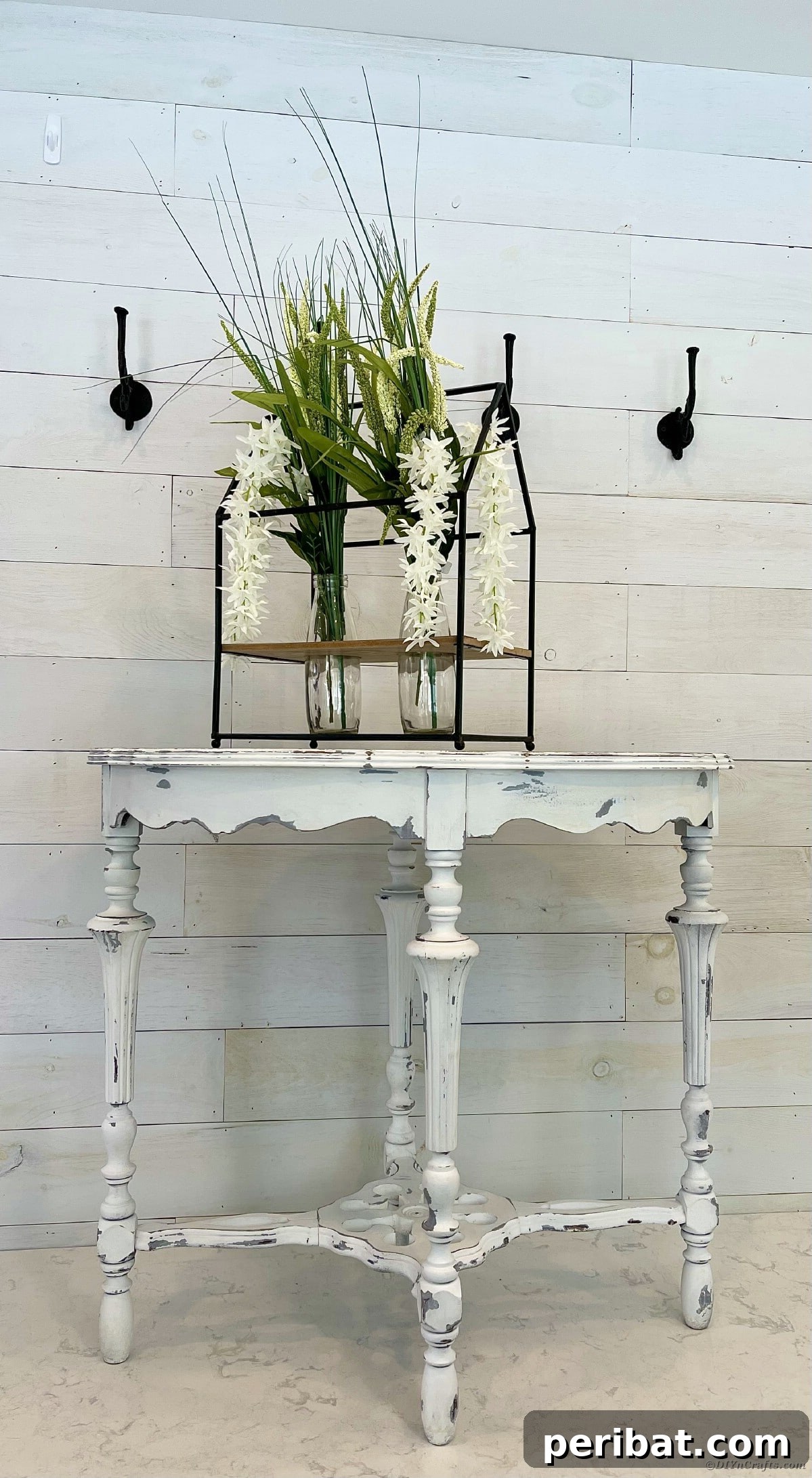 Chippy Charm Side Table Transformation 17 Weathered white side table with floral display against white wall