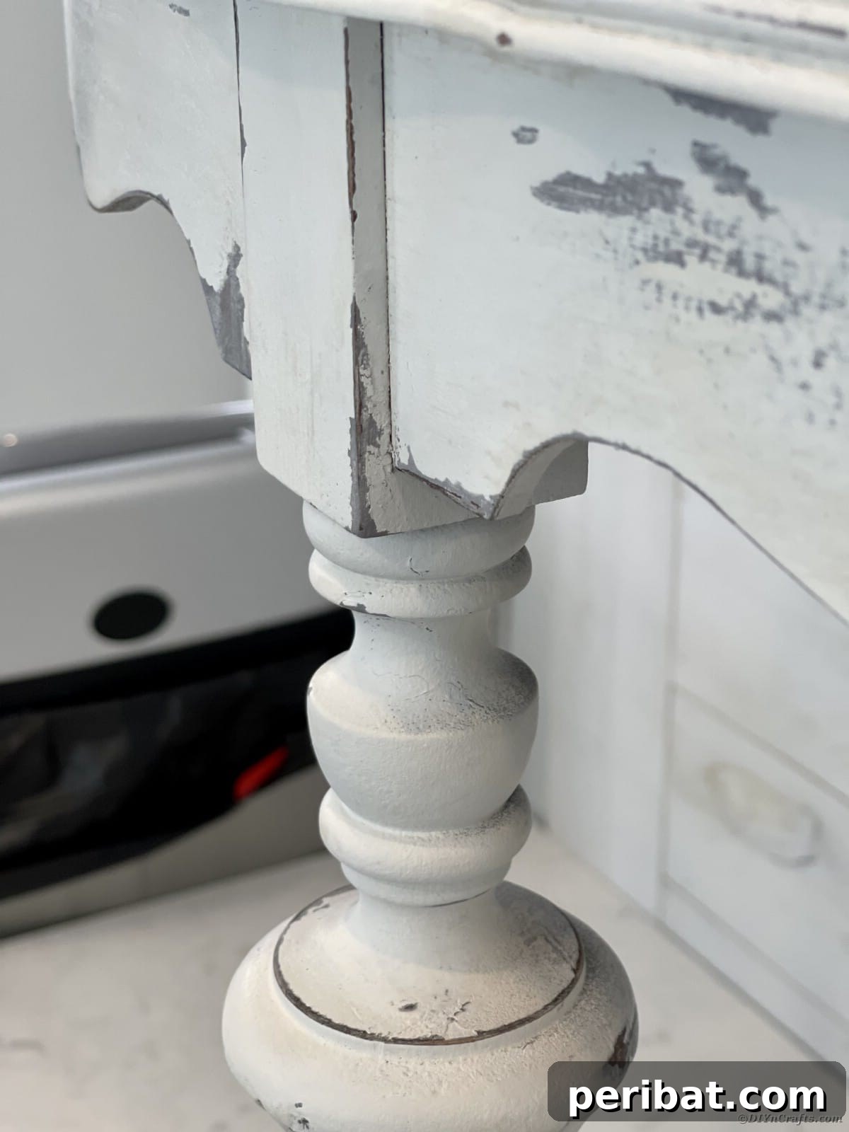 Chippy Charm Side Table Transformation 4 Corner of end table that has been weathered with white and gray