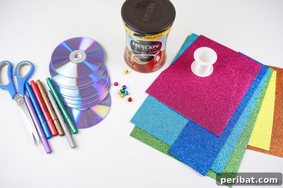 Sparkling Repurposed Garden Melody 7 A collection of colorful craft supplies laid out on a white table, ready for wind chime creation.