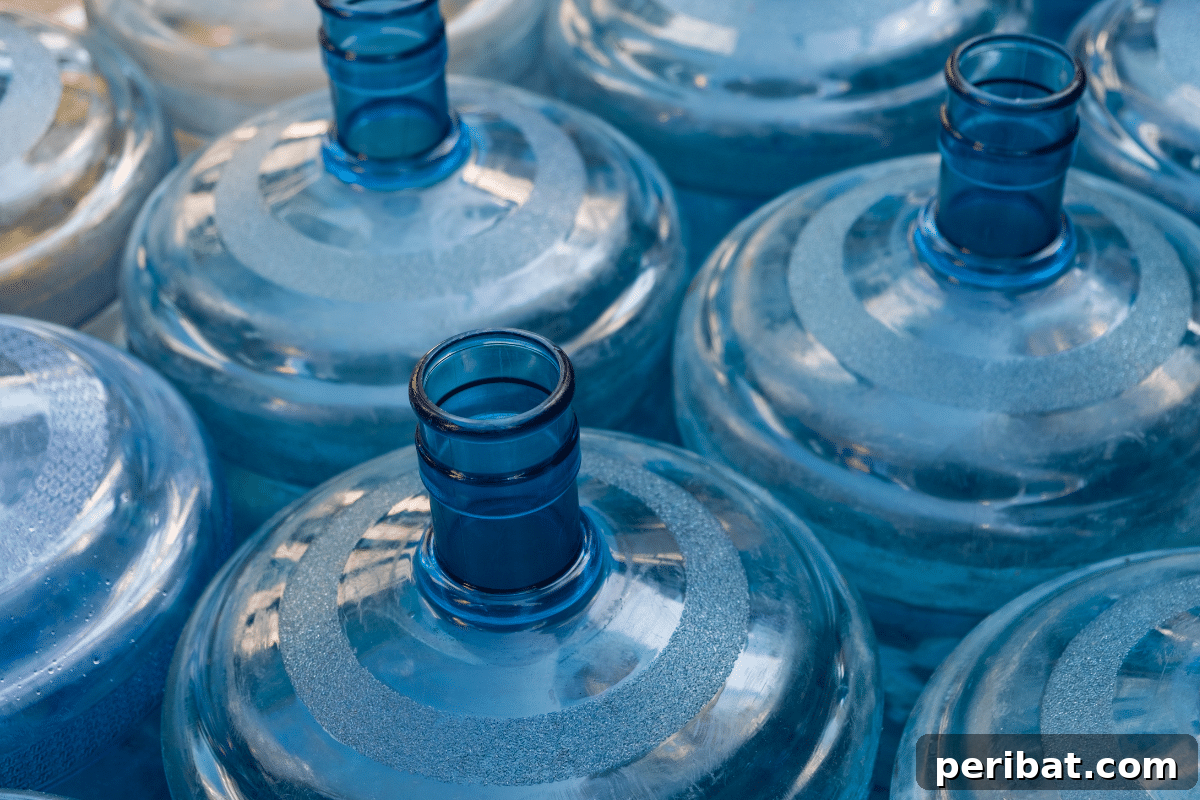 Upcycled Garden Cloches: Clever Ways to Shield Your Plants 7 empty water dispenser