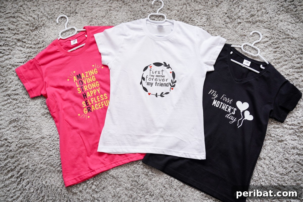 Three custom Mother's Day t-shirts laid out on a gray carpet