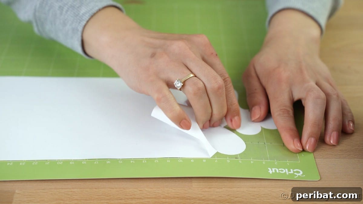 Peeling excess vinyl off of Cricut mat after cutting