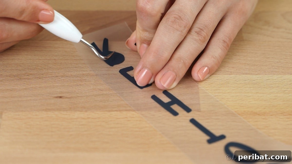 Weeding black letters for the 'Mom' design