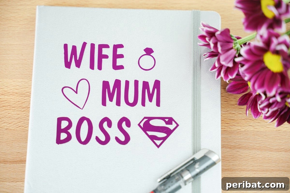 Craft Personalized Vinyl Journals for Mother's Day 8 Close up of purple 'Wife Mum Boss' message on gray notebook