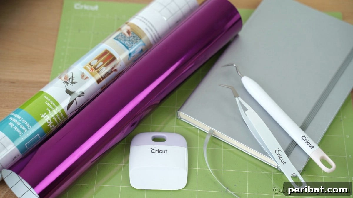 Craft Personalized Vinyl Journals for Mother's Day 9 Purple foil roll on top of Cricut mat by gray journal