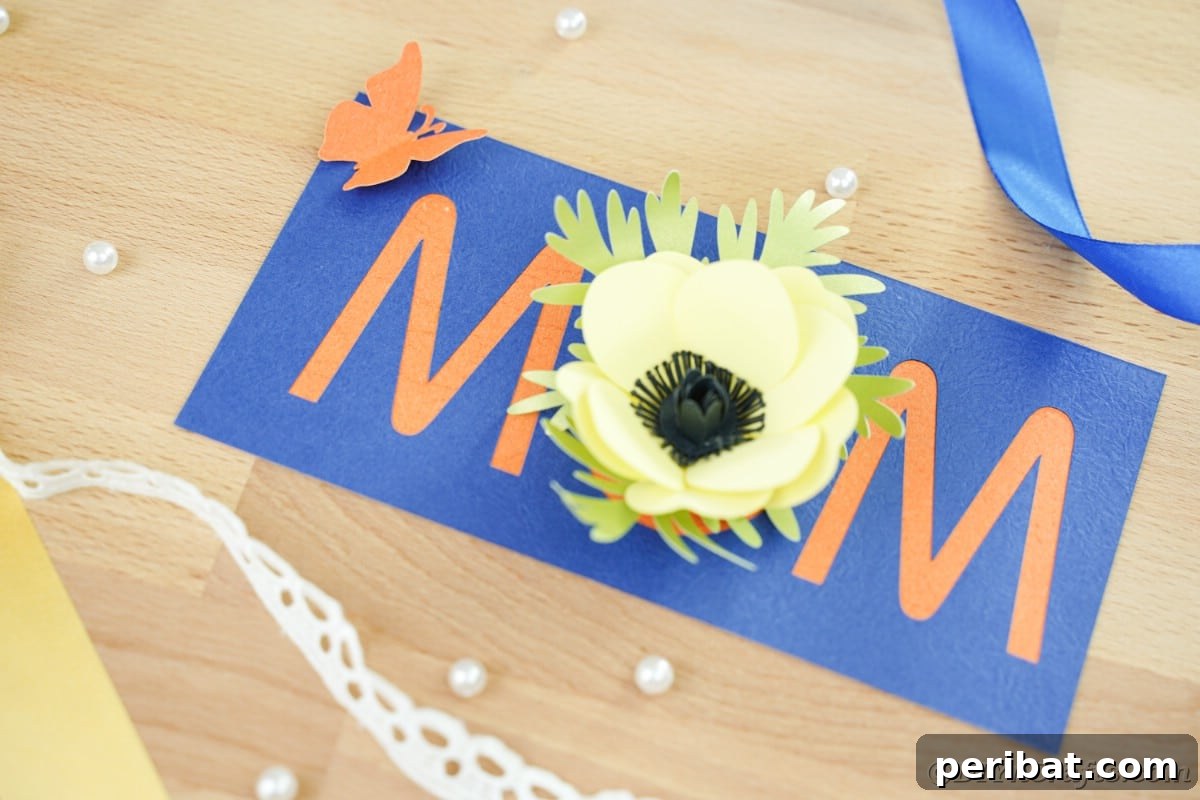 Mom card with blue and orange and yellow flower