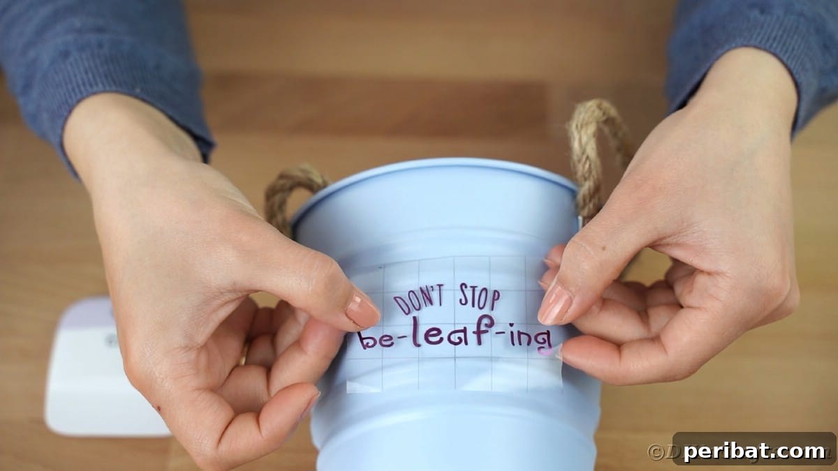 Centering vinyl on metal bucket, ensuring proper alignment