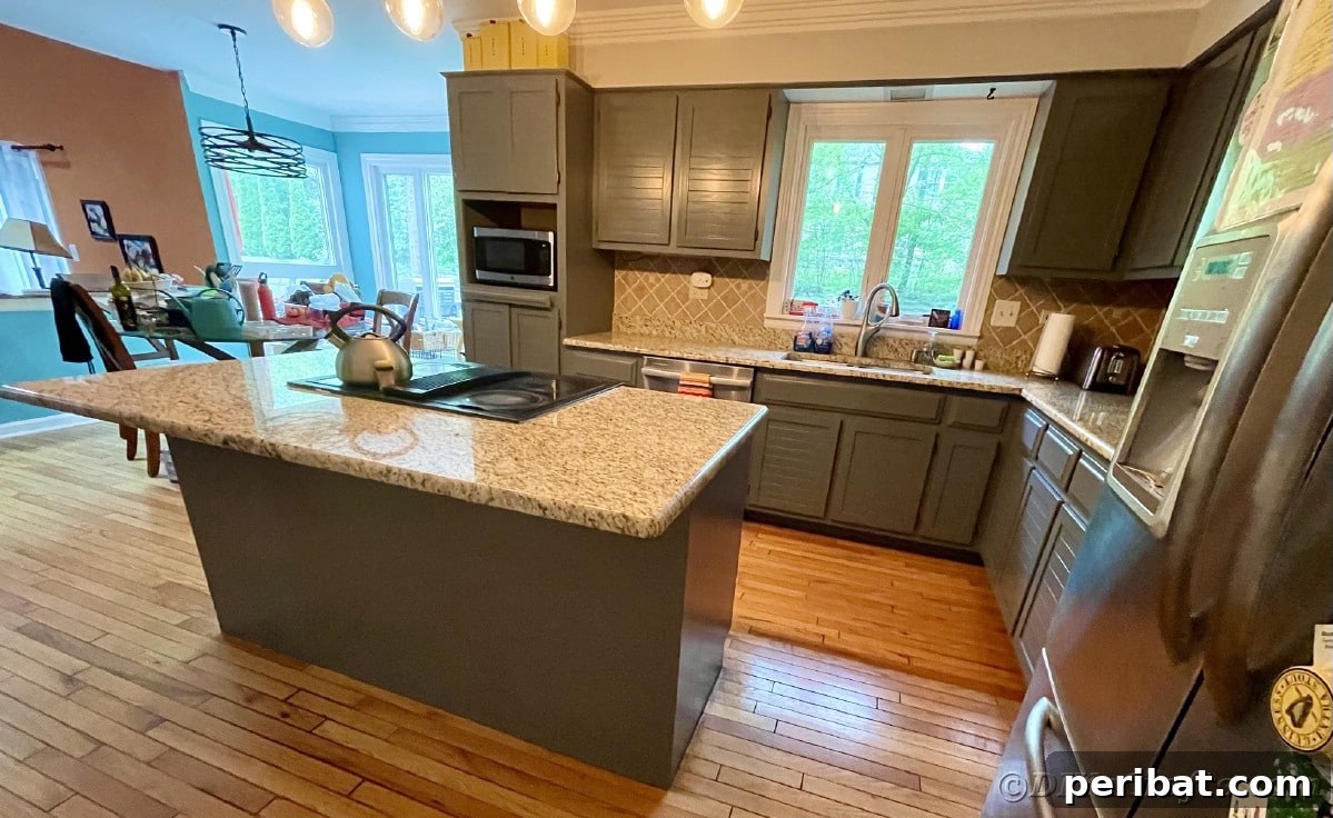 Close-up of marbled countertops in a kitchen, contrasting beautifully with gray cabinets