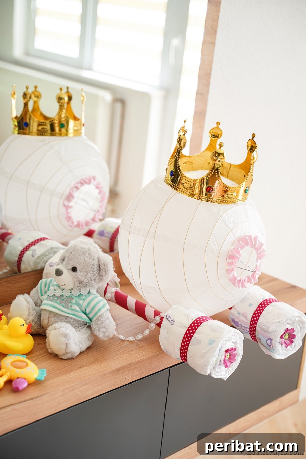 Enchanting Diaper Carriage Baby Shower Surprise 19 Diaper cake on dresser by mirror