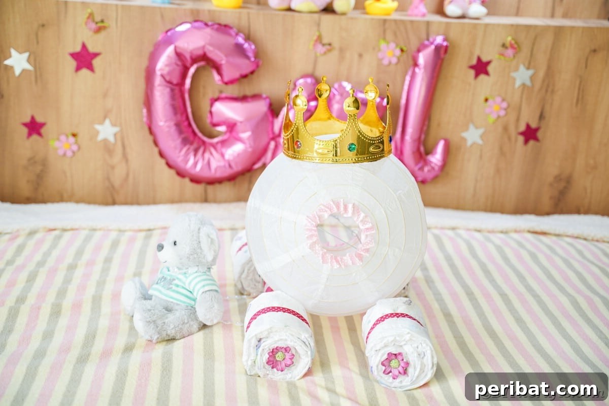 Enchanting Diaper Carriage Baby Shower Surprise 27 Diaper cake on bed in front of pink girl balloons