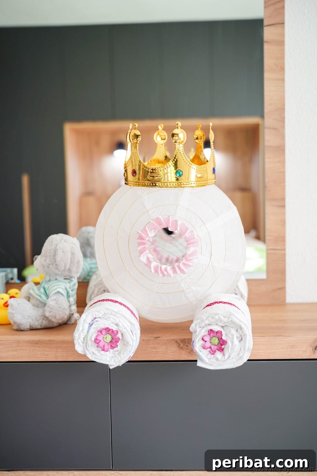 Enchanting Diaper Carriage Baby Shower Surprise 7 Diaper cake in front of mirror