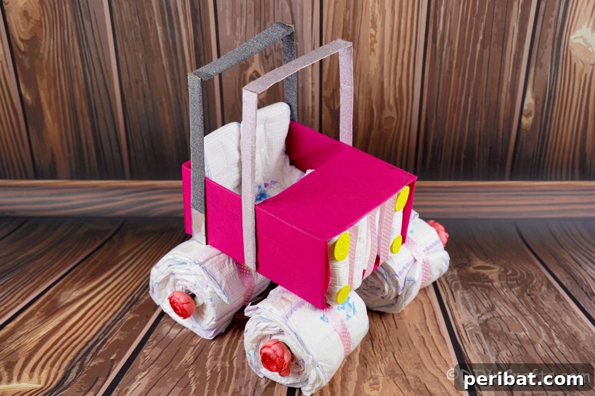 hot pink safari diaper cake car on wood table