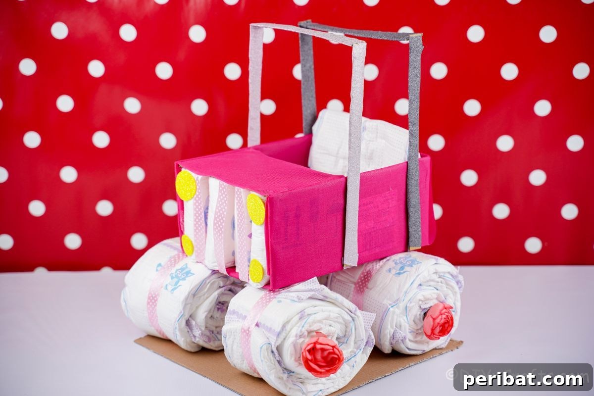red and white polka dot background with safari car diaper cake in front
