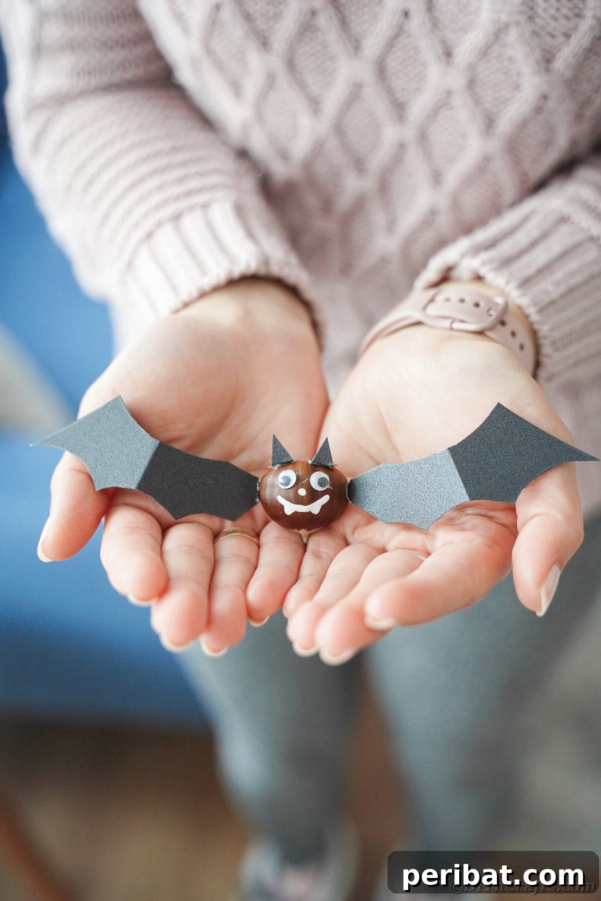 Woman holding chestnut bat in hands