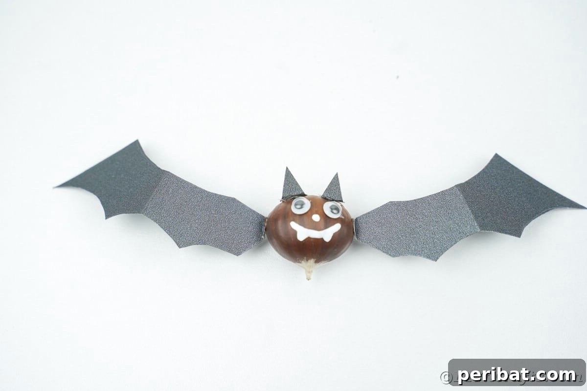 Black craft bat on white table