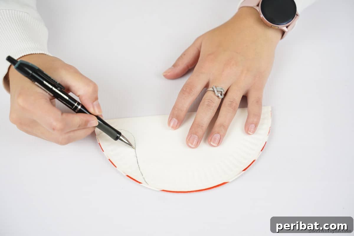 Hand drawing on halved paper plate